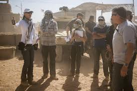 Bigelow leading her crew, directing in the desert, strong women in leadership roles