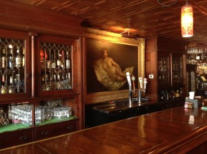 Knoxville's Bistro at the Bijou features a lovely painting of a nekkid (yes, I do mean naked) lady over the bar. Huzzah!