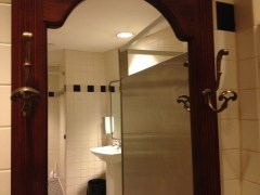 Check your look in Bistro's mirrored etagere.