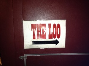 You can't miss the restroom sign at Knoxville's Bistro at the Bijou.