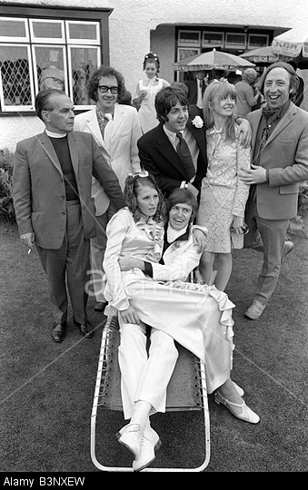 British musician and poet Roger McGough (second from left) standing beside Beatle Paul McCartney in this 1968 wedding photo.