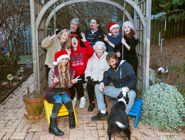 Daddy in the middle of our family's group Christmas photo, 2013