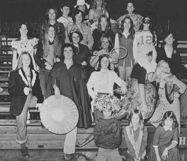 The 1975 high school drama club with Tom Parkhill standing (front row 2nd from left) with what looks like a humongous fan.